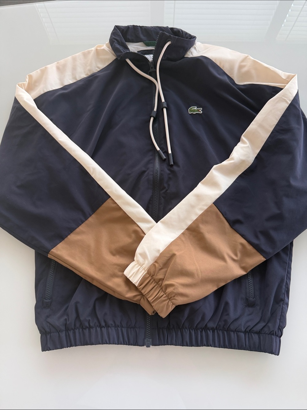 Lacoste Men’s Colorblock Windbreaker in Navy, Tan & Cream